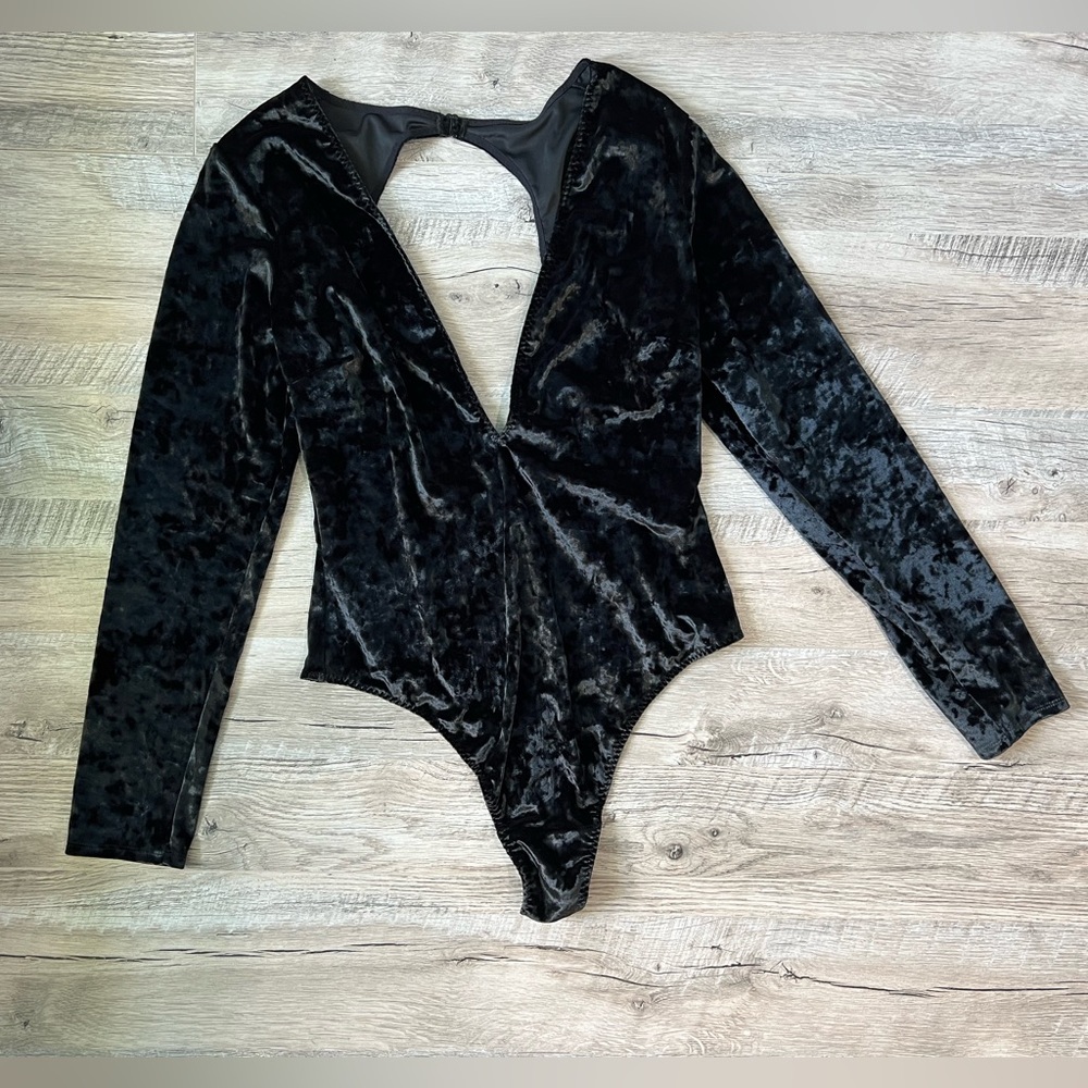 Victoria's Secret NWT Black Velvet Body Suit
Long Sleeve Deep V Neck Size M/L
